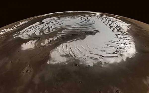 Ученый НАСА поделился с юзерами Интернета снимками зимнего Марса